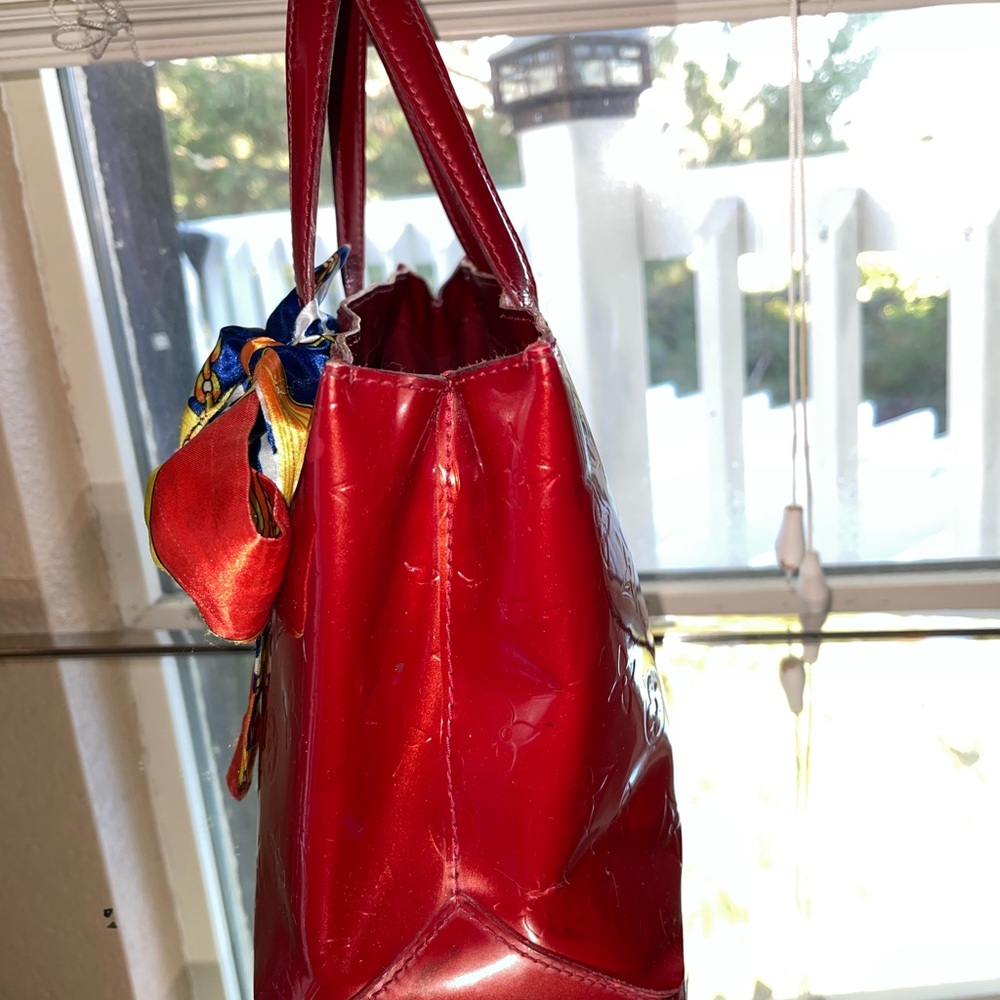 Luis Vuitton Red Bag With Lock And Key - image 4